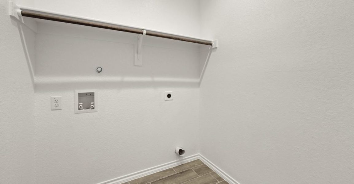 Representative exterior photo of a completed home built from the Hadleigh by Impression Homes in Mountain Valley, Burleson, TX (Image 24). Representative exterior photo of a completed home built from the Hadleigh by Impression Homes in Mountain Valley, Burleson, TX (Image 24).