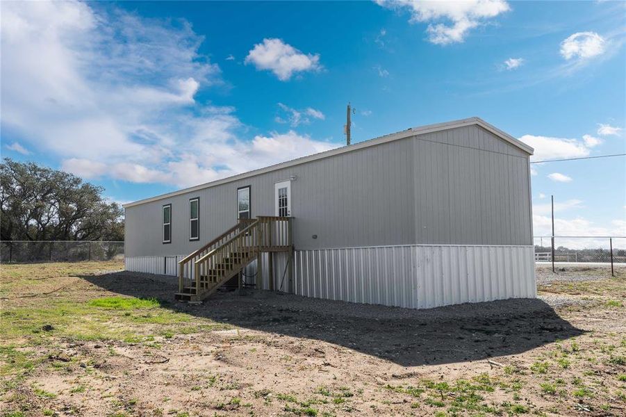 Exterior details and patio area of a home in , Brownwood (Image 21). Exterior details and patio area of a home in , Brownwood (Image 21).