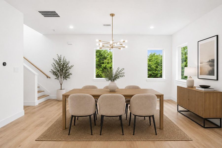 View of dining area. Photo is virtually staged.
