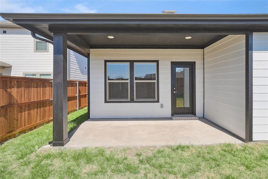 Exterior details and patio area of a home in Lakehaven - Spring Series, Farmersville (Image 22).