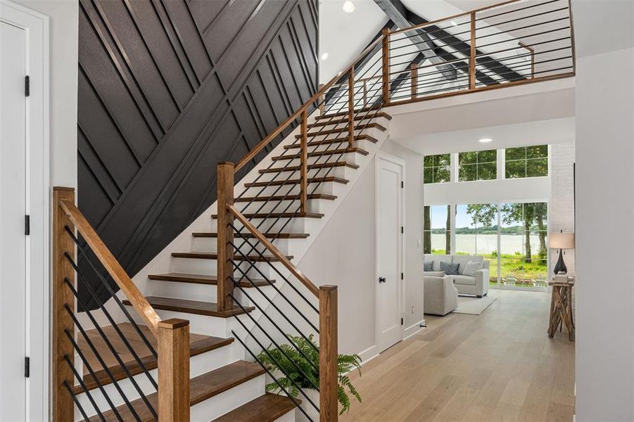 Off entry staircase leading to 3 bedrooms and second living space Off entry staircase leading to 3 bedrooms and second living space