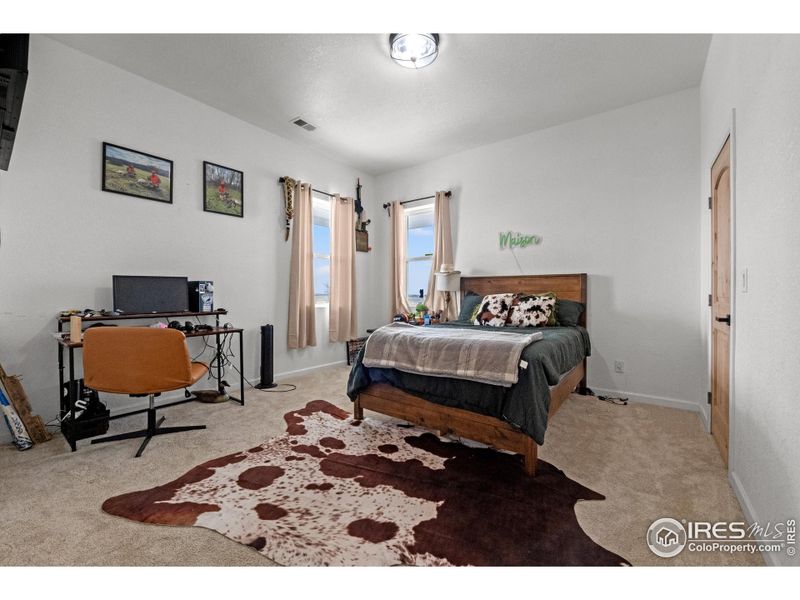 Spacious fourth bedroom.