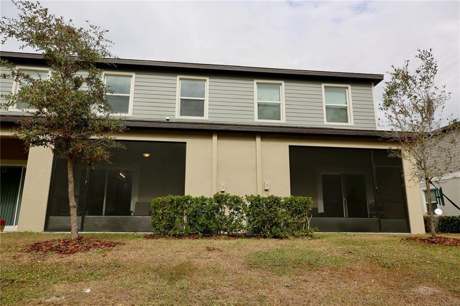 Front exterior of a new home in , Land O' Lakes, FL, highlighting curb appeal (Image 1).