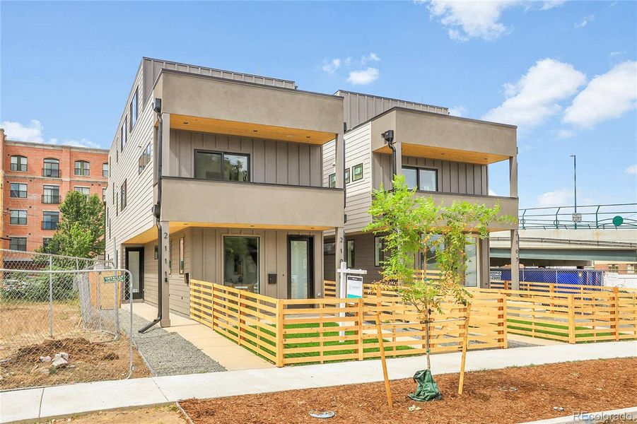 Front exterior of a new home in , Denver, CO, highlighting curb appeal (Image 23).