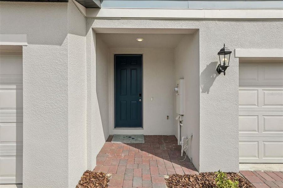 Exterior details and patio area of a home in Cagan Crossings West, Clermont (Image 4).