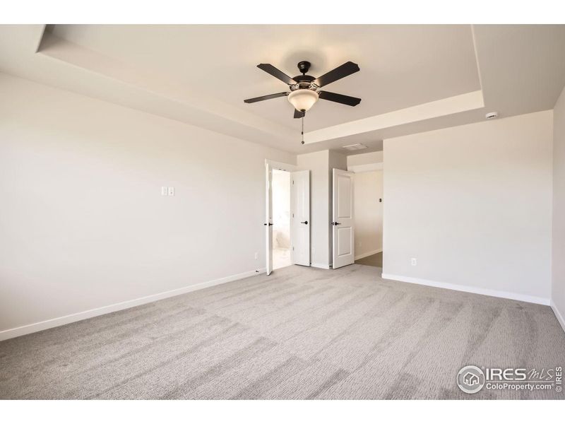 Spacious, unfurnished interior of a new home in RainDance National 60/70, Windsor (Image 14).