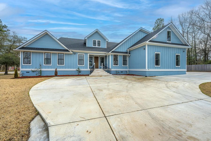 Front exterior of a new home in , Ladson, SC, highlighting curb appeal (Image 2). Front exterior of a new home in , Ladson, SC, highlighting curb appeal (Image 2).