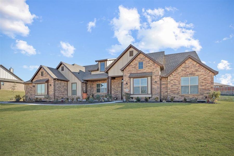 Craftsman inspired home with a front yard Craftsman inspired home with a front yard