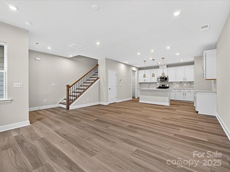 From Great Room to Kitchen These Spaces are Beautifully Blended.