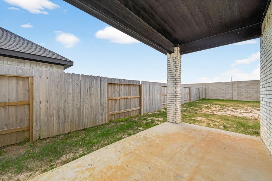Exterior details and patio area of a home in Sunterra, Katy (Image 3).