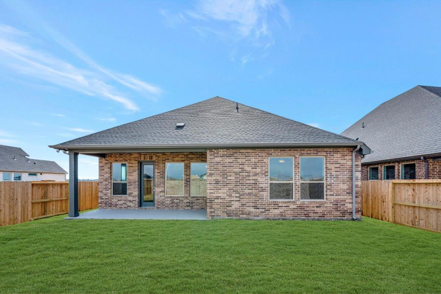 Exterior details and patio area of a home in Beacon Point at Lago Mar 50’ Homesites, Texas City (Image 3).