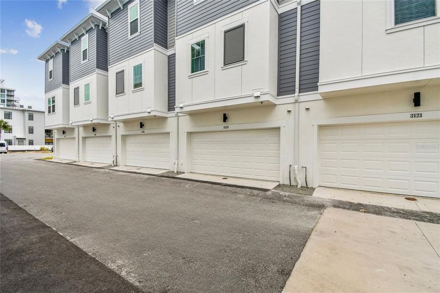Exterior details and patio area of a home in Towns at Union, St. Petersburg (Image 28).
