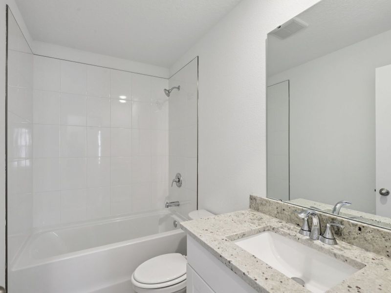 Furnished interior view inside a new home in Flagler Village - Classic Series, Palm Coast (Image 8).