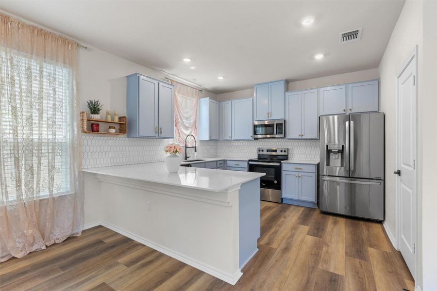 Furnished interior view inside a new home in , Manor (Image 9).