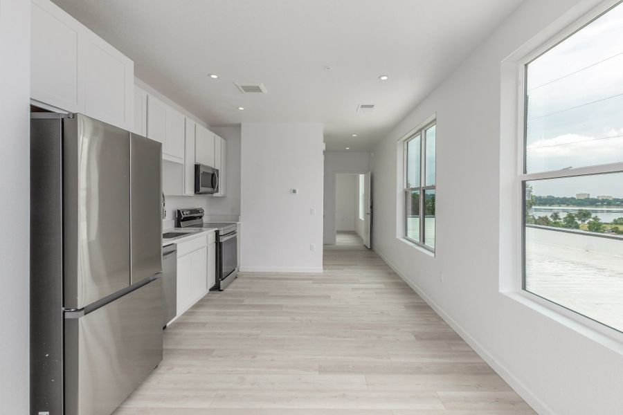 Spacious, unfurnished interior of a new home in The Scene at Sloan's Lake, Denver (Image 9). Spacious, unfurnished interior of a new home in The Scene at Sloan's Lake, Denver (Image 9).