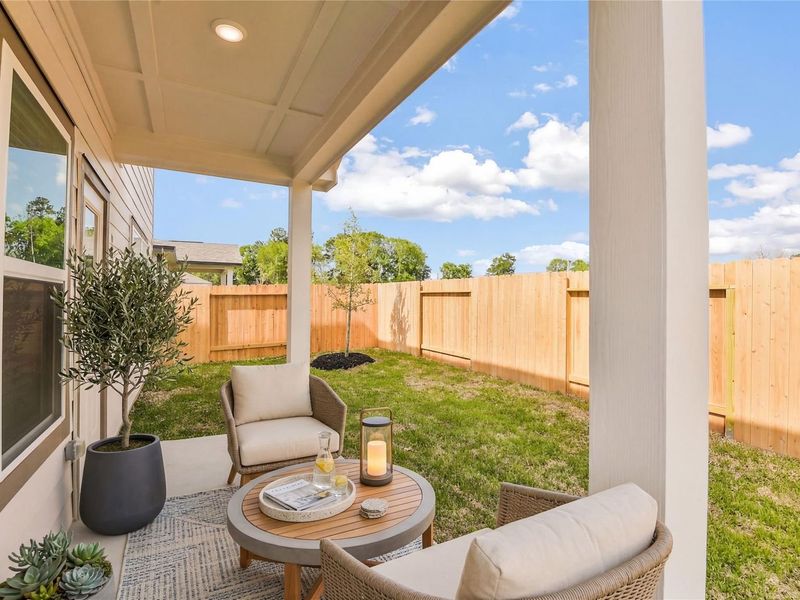 Exterior details and patio area of a home in Caney Creek Place, Conroe (Image 29).