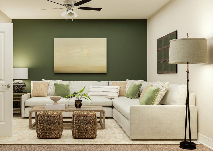 Rendering of loft space showing white
  couch and coffee table along a green accent wall and ceiling fan above with
  beige capret flooring throughout.