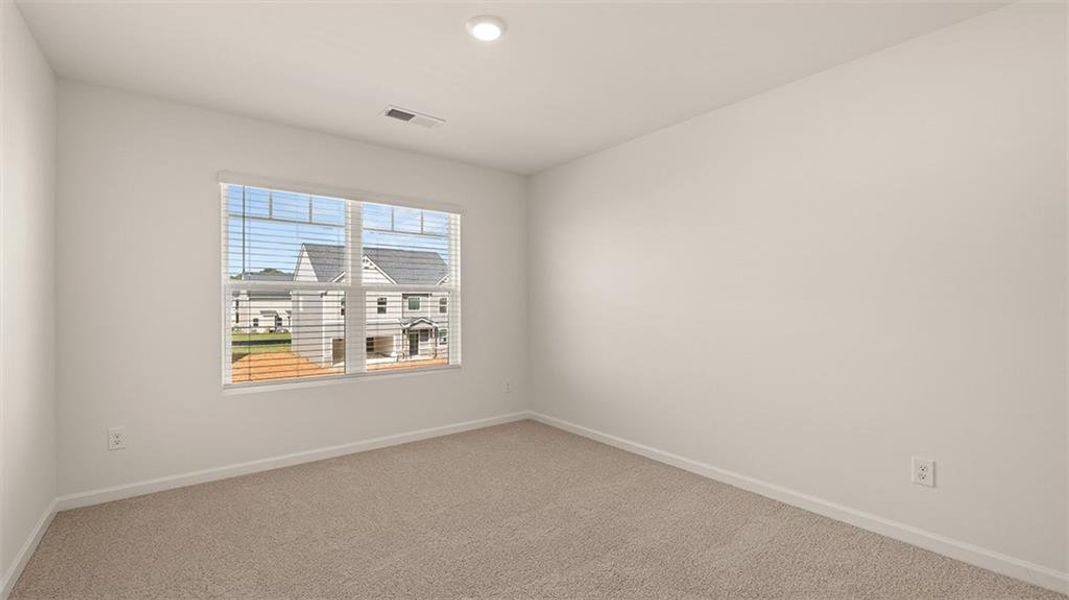 Spacious, unfurnished interior of a new home in Preserve at Dove Creek, Statham (Image 27).