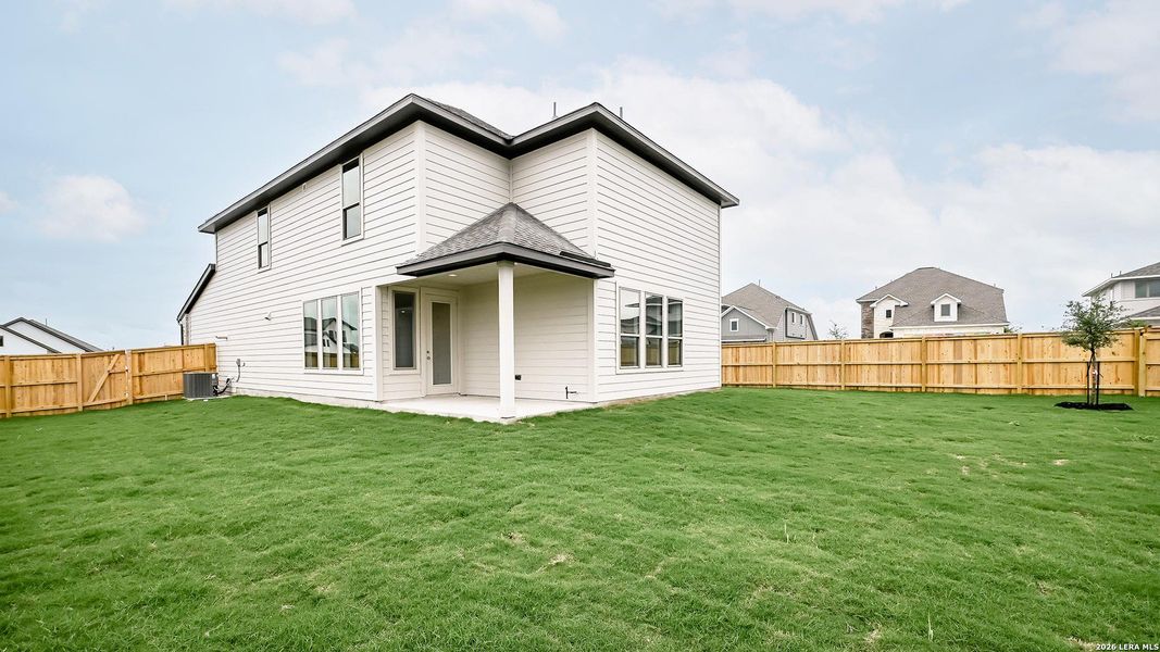 Exterior details and patio area of a home in The Parklands, Schertz (Image 3).