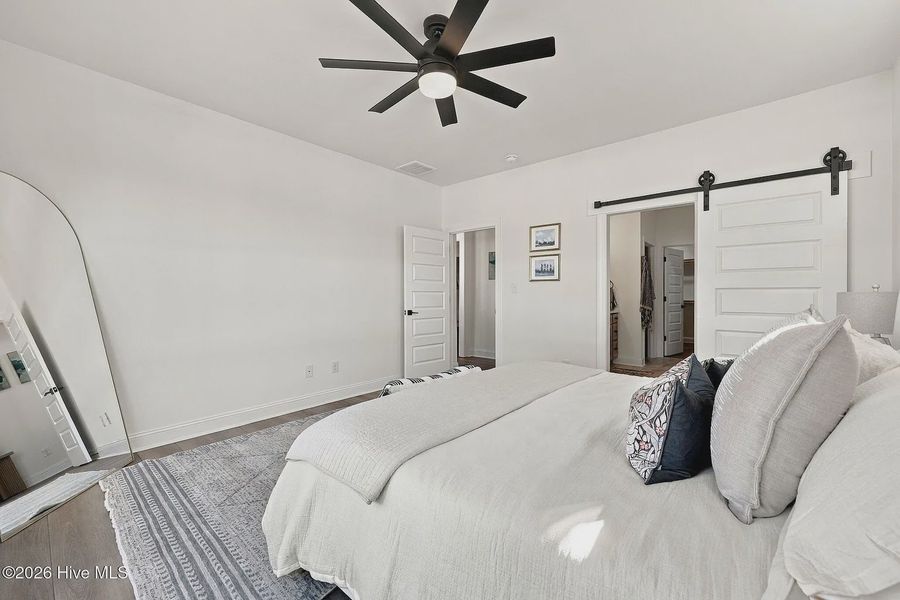 Furnished interior view inside a new home in Dixon Grove, Grimesland (Image 8).