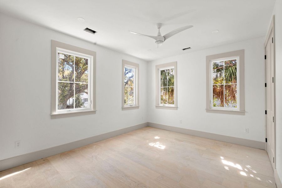 Spacious, unfurnished interior of a new home in , Isle Of Palms (Image 16).