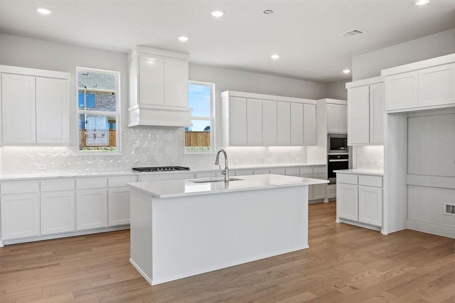 Furnished interior view inside a new home in The Heights at Uptown Celina, Celina (Image 7). Furnished interior view inside a new home in The Heights at Uptown Celina, Celina (Image 7).