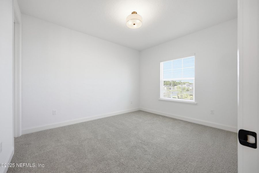 Spacious, unfurnished interior of a new home in Silver Landing At Silverleaf, St. Augustine (Image 18).