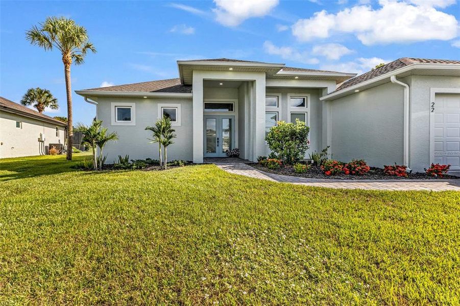 Front exterior of a new home in , Rotonda West, FL, highlighting curb appeal (Image 21).