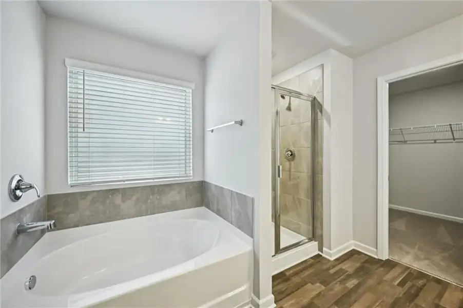 Furnished interior view inside a new home in The Hills at Cedar Creek, Winder (Image 10).