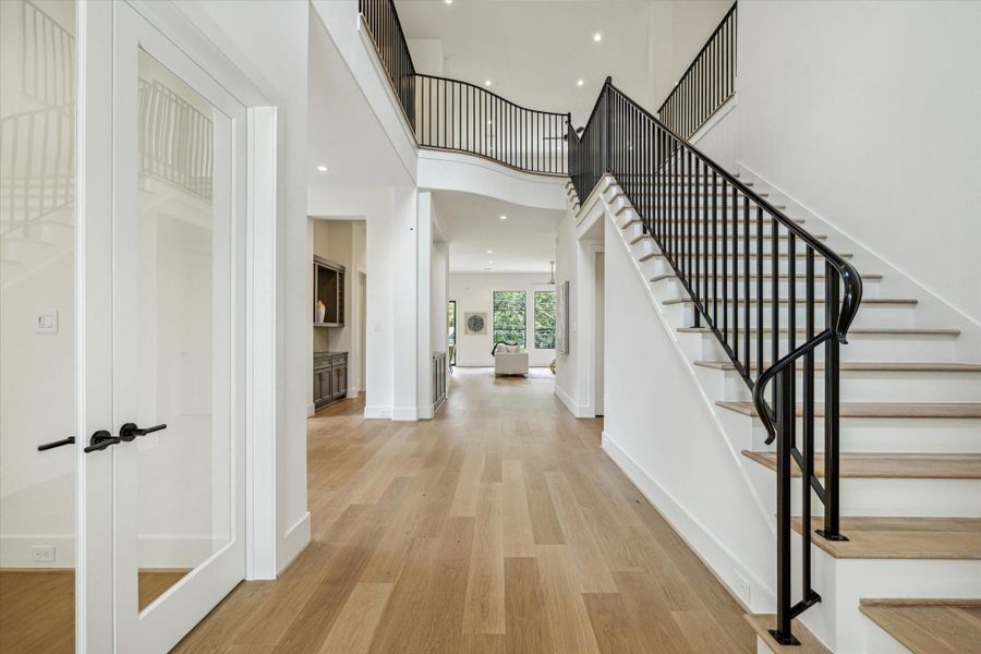 22' soaring ceilings upon entry.