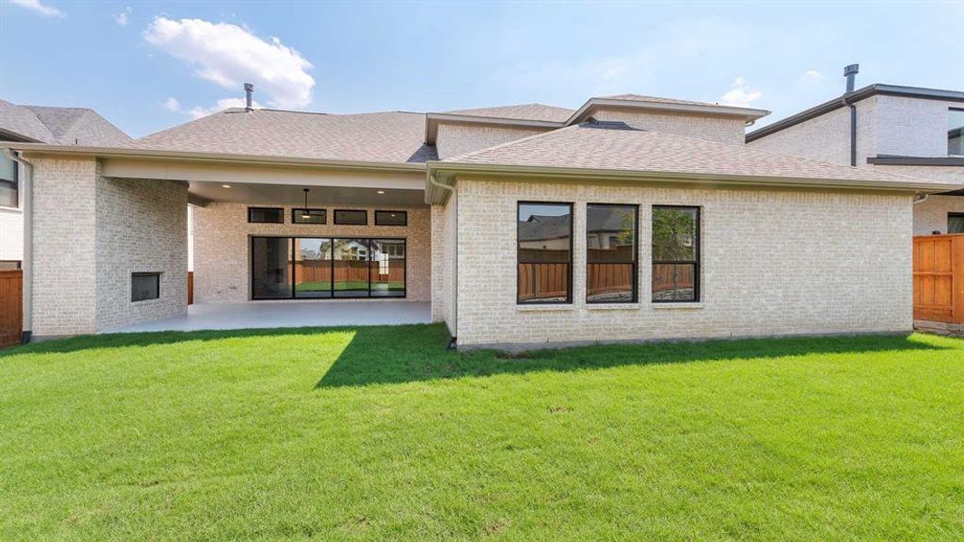 Exterior details and patio area of a home in Fields 60', Frisco (Image 3). Exterior details and patio area of a home in Fields 60', Frisco (Image 3).