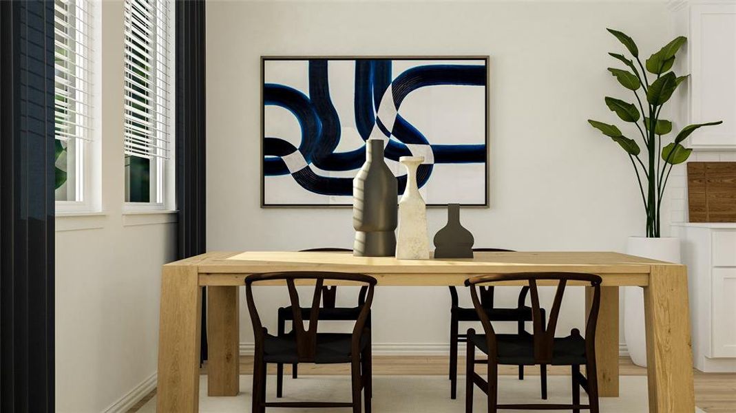 Dining room with light hardwood / wood-style flooring