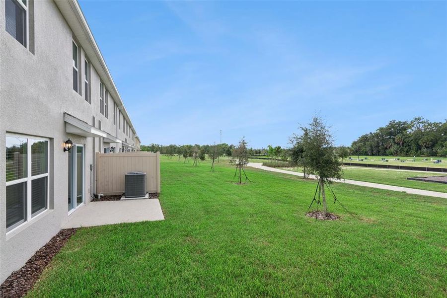 Exterior details and patio area of a home in Vineland Reserve, Osteen (Image 3).