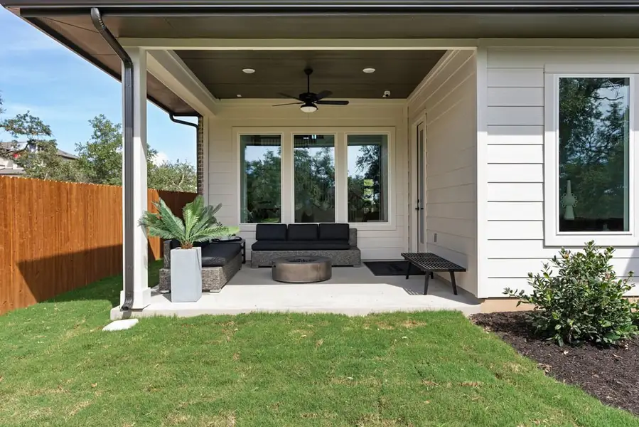 Exterior details and patio area of a home in Park Collection at Heritage, Dripping Springs (Image 2).