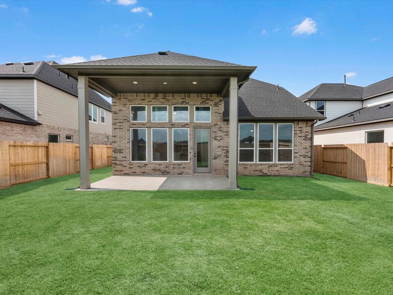Exterior details and patio area of a home in Pecan Ridge, Fulshear (Image 3).