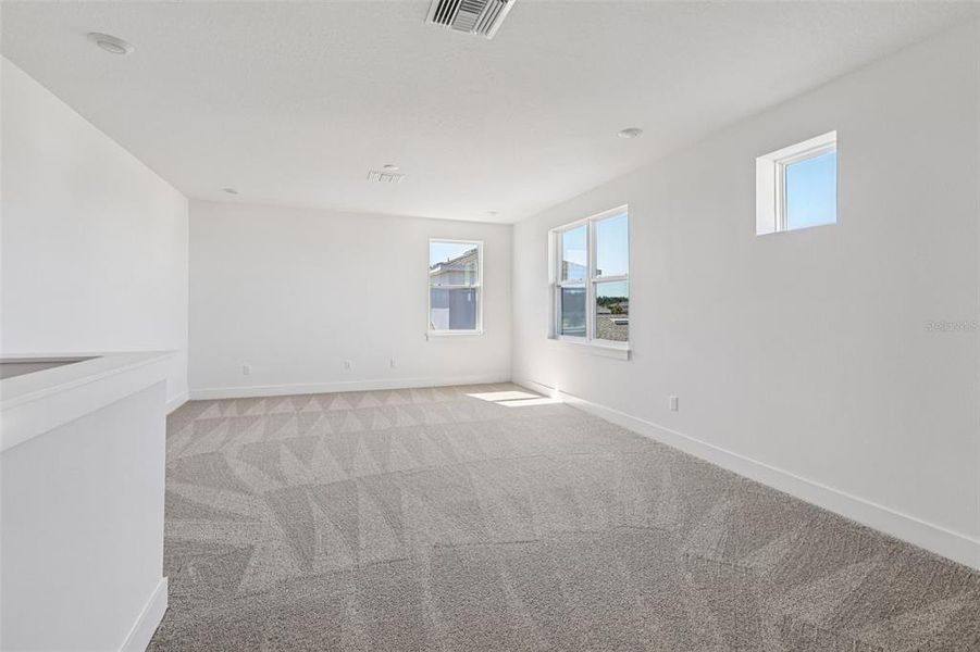 Spacious, unfurnished interior of a new home in Eagles Cove at Mirada, San Antonio (Image 38).