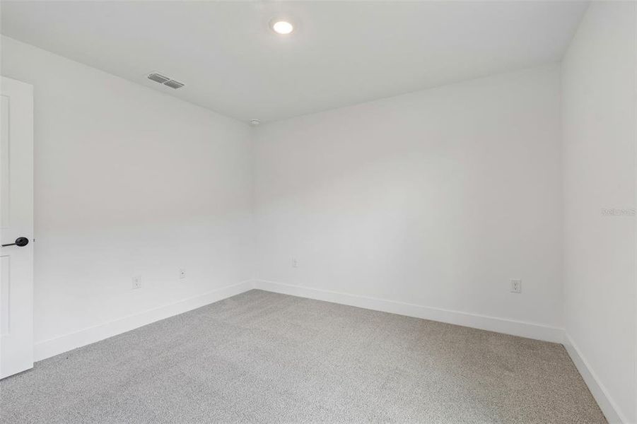 Spacious, unfurnished interior of a new home in Abbey Glen, Dade City (Image 71).