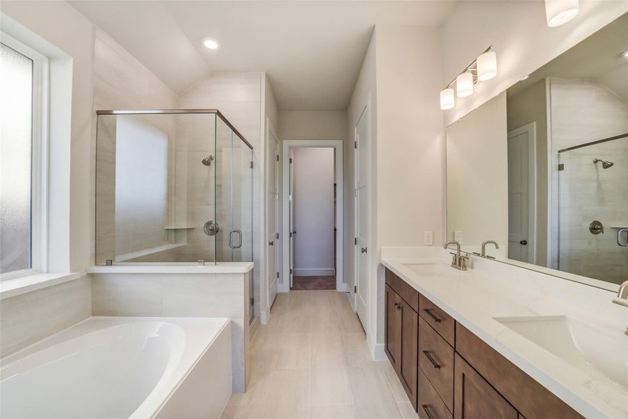 Furnished interior view inside a new home in Sunterra, Katy (Image 6).