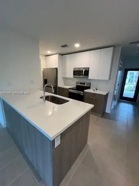 Furnished interior view inside a new home in , Hollywood (Image 5).