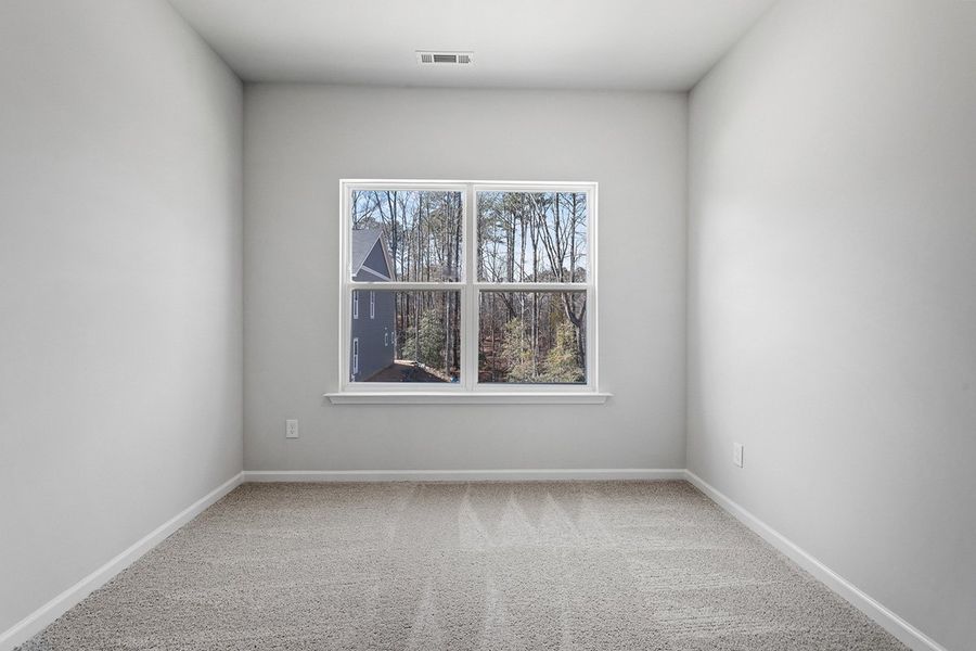 Spacious, unfurnished interior of a new home in Renaissance at White Oak, Garner (Image 14).