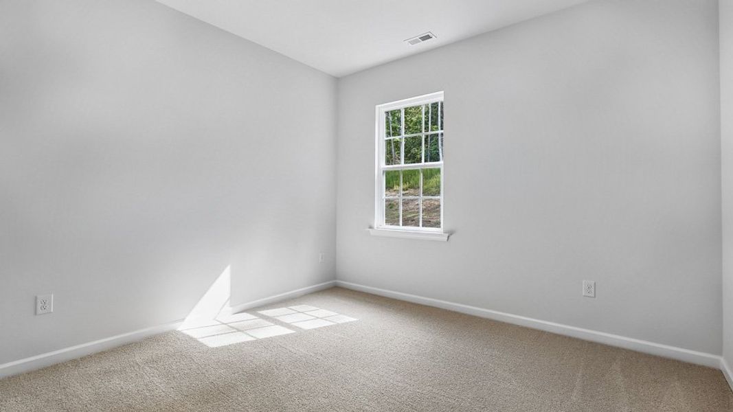 Spacious, unfurnished interior of a new home in Tyler - Home on the Lake, New Bern (Image 12).