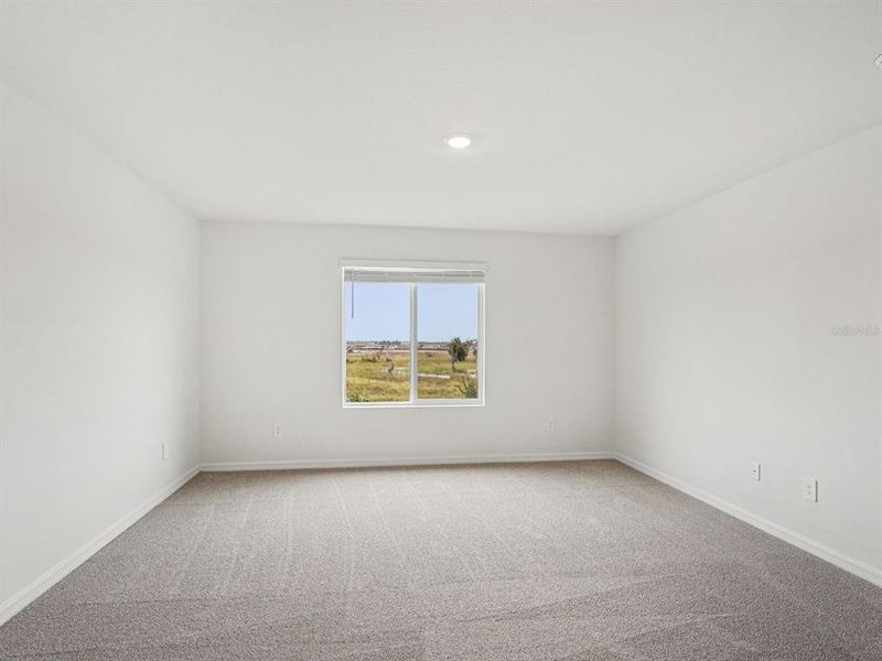 Spacious, unfurnished interior of a new home in Coasterra - Premier Series, Palmetto (Image 28).