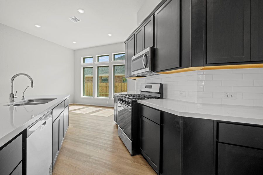 Furnished interior view inside a new home in The Trails, New Caney (Image 8).