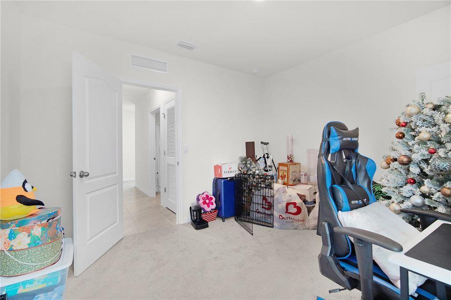 Furnished interior view inside a new home in Kindred, Kissimmee (Image 18).