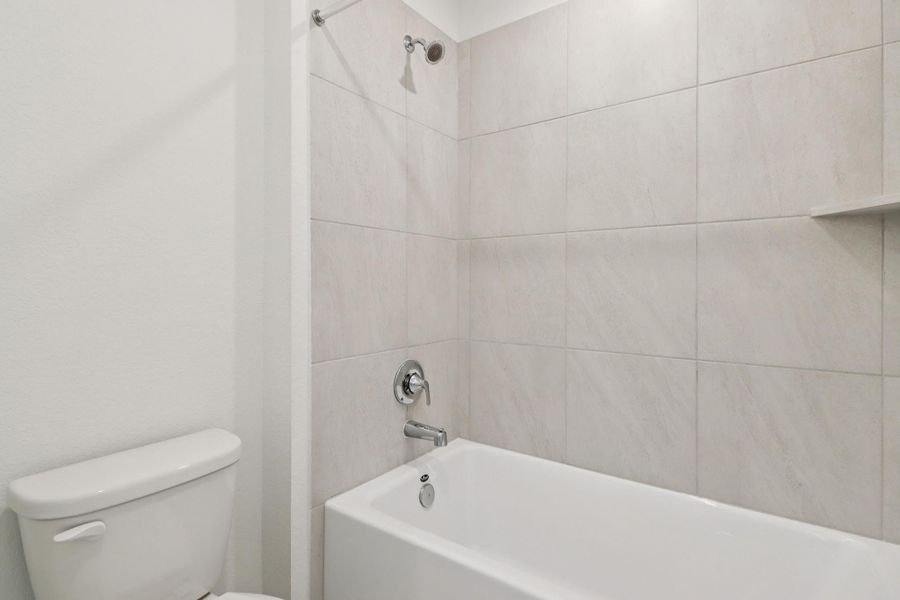 Furnished interior view inside a new home in Sanford Farms - Premier Series, Waller (Image 5).