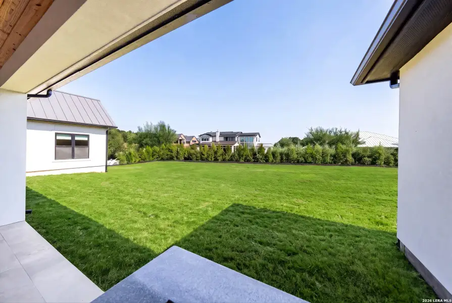 Exterior details and patio area of a home in , San Antonio (Image 4).