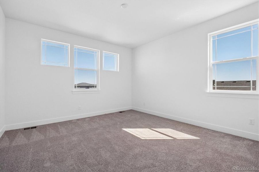 Spacious, unfurnished interior of a new home in Peakview at Ascent Village, Littleton (Image 28).