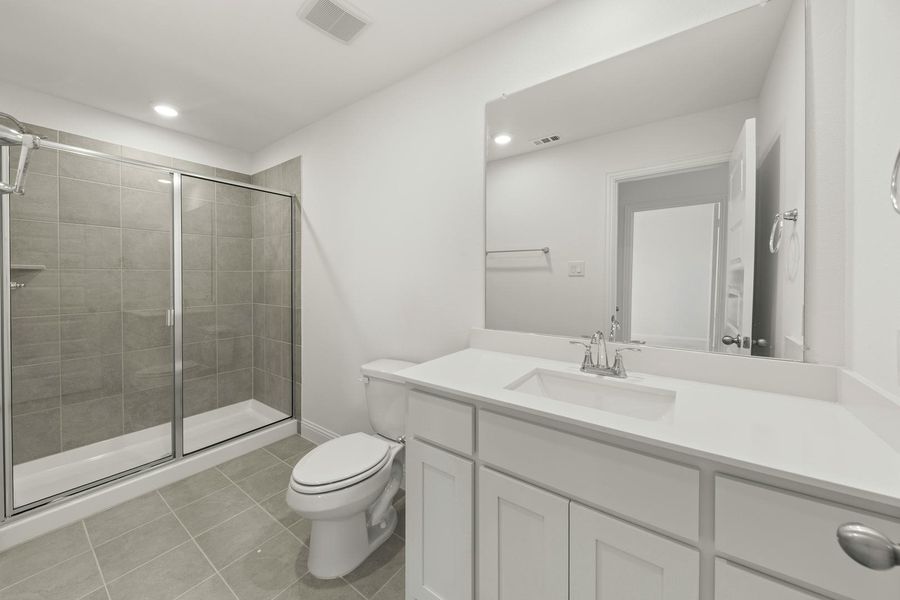 Furnished interior view inside a new home in Park Trails, Forney (Image 17).