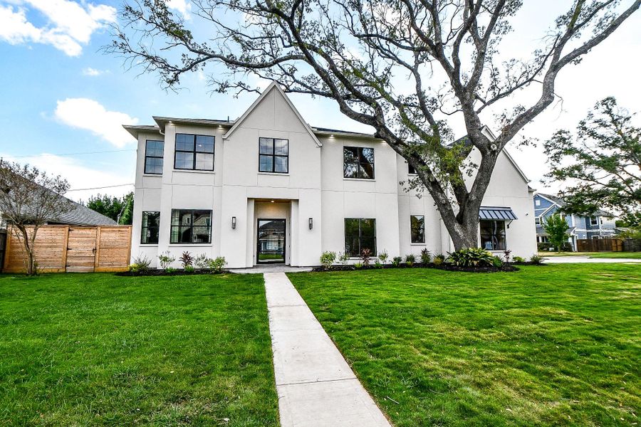 Front exterior of a new home in , Houston, TX, highlighting curb appeal (Image 23).