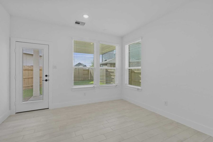 Spacious, unfurnished interior of a new home in Elyson Courtyard Collection, Katy (Image 10).